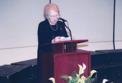 <span class='aslide1'>Sister A.T. Sheehan, addressing the audience at the Great Hall, Universith Of Toronto</span>